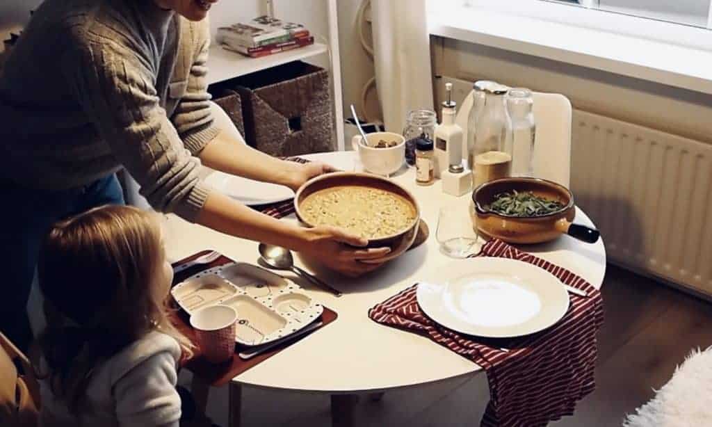 Dietitian serving vegan family meal - Veggies & More